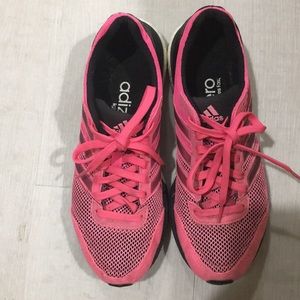 Pink adidas running shoes